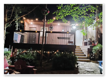 A picture of our cabins all lit up at night